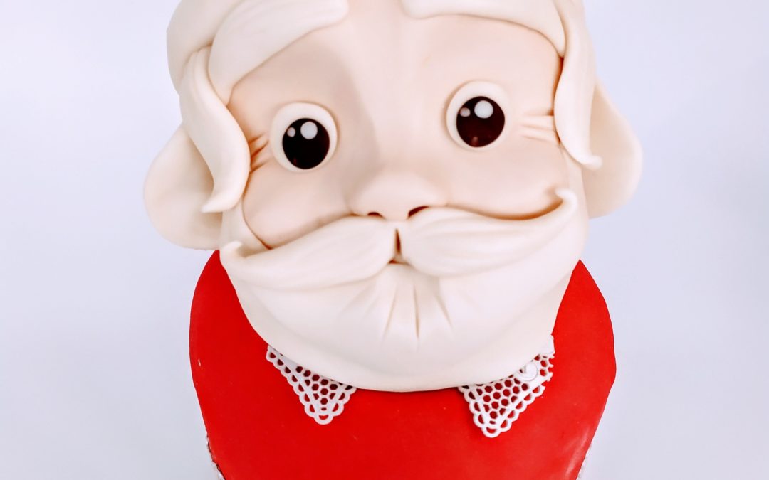 BABBO NATALE IN PASTA SCULTURA SU PANETTONE